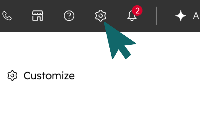 HubSpot top menu with the settings gear icon